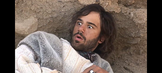 Jared Michaels as Picaro Gonnof reacts as an Indian's blood splatters near him in Meaner Than Hell (2009)
