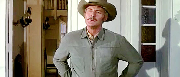 John Agar as Bert Ryan, foreman of the McCandles ranch when it's raided in Big Jake (1971)