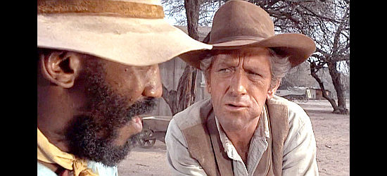 John Anderson as Stretch, a cowboy who once worked alongside Caleb Revers in Man and Boy (1971)