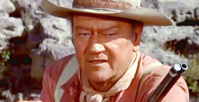 John Wayne as John 'Big Jake' McCandles, wondering if he should intervene in a lynching in Big Jake (1971)