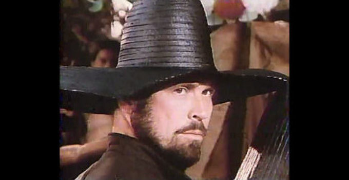 Tom Laughlin as Finely, the front of his sombrero chopped off by adversaaries in The Master Gunfighter (1975)