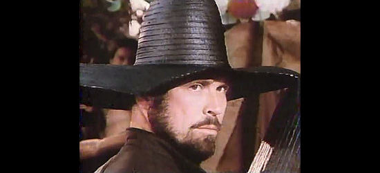 Tom Laughlin as Finely, the front of his sombrero chopped off by adversaaries in The Master Gunfighter (1975)