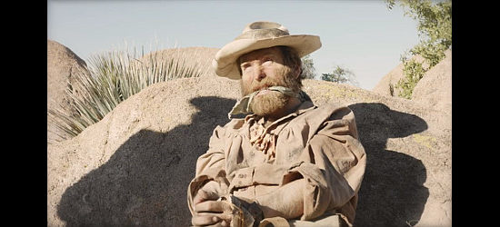 Travis Mills as the captured Comanchero in Counting Bullets (2021)