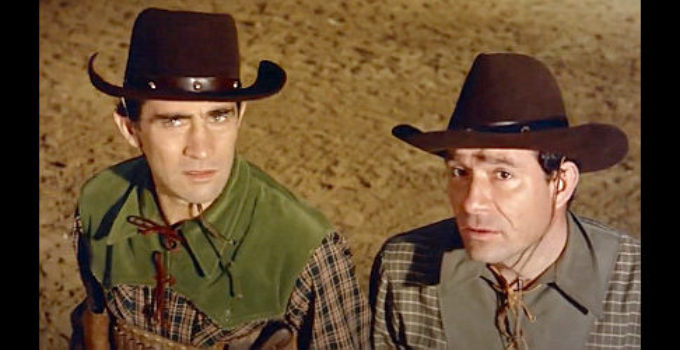 Walter Chiari as Mike and Ugo Tognazzi as Alamo, realizing Danger City might be hazardous to their health in A Dollar of Fear (1960)