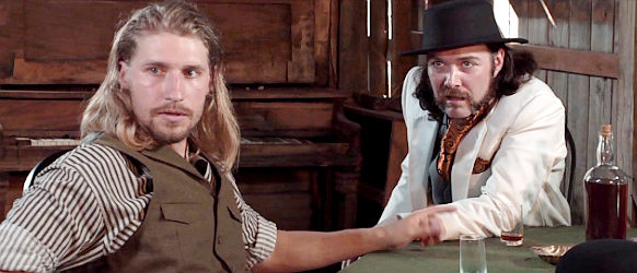 Warren Gavit as Waylon Ford and Andy Arrasmith as Tully Ford, about to face a showdown with the man they robbed in Honor Among Thieves (2021)