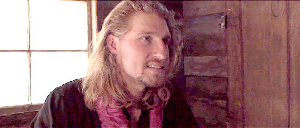 Warren Gavit as Waylon Ford, one of the brother oil barrons in Honor Among Thieves (2021)