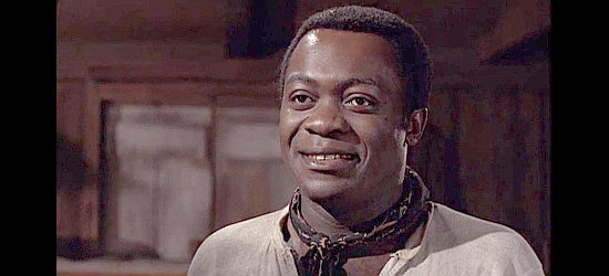 Yaphet Kotto as Nate, a cowboy determined to prove he's a better man than Revers in Man and Boy (1971)