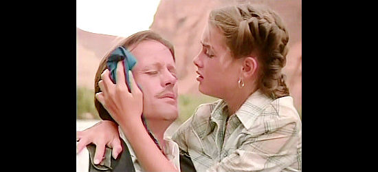 Brooke Shields as Wanda Nevada fussing over a wounded Beaudray Demerille (Peter Fonda) in Wanda Nevada (1979)