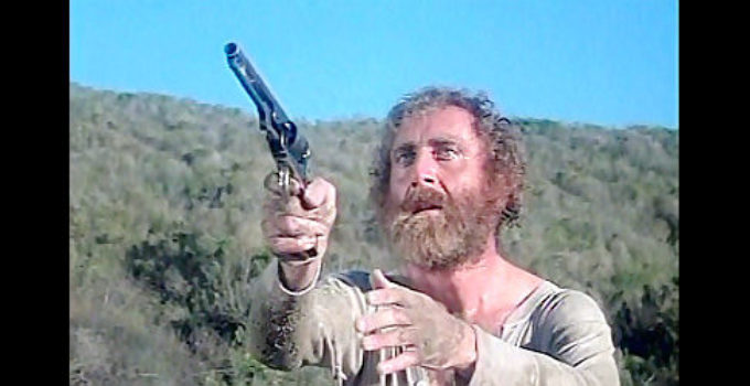Gene Wilder as Avfram Belinski, forced to take up a gun to defend himself in The Frisco Kid (1979)
