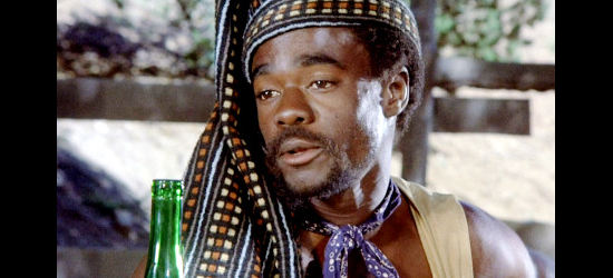 Glynn Turman as Jomo J. Anderson, the bandit from Jamaica in Thomasine and Bushrod (1974)