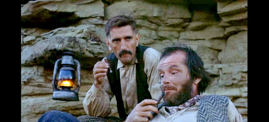 Harry Dean Stanton as Calvin and Jack Nicholson as Tom Logan plot their rustling future in The Missouri Breaks (1976)