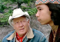 Joel McCrea as Dan, sharing some of his wisdom with Indian yough Nika (Nika Mina) in Mustang Country (1976)