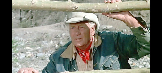 Joel McCrea as Dan, with the elusive mustang nearly trapped in Mustang Country (1976)