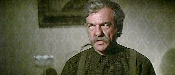 Karl Madden as Walter Buckman, laying down the law to his sons in Wild Rovers (1971)