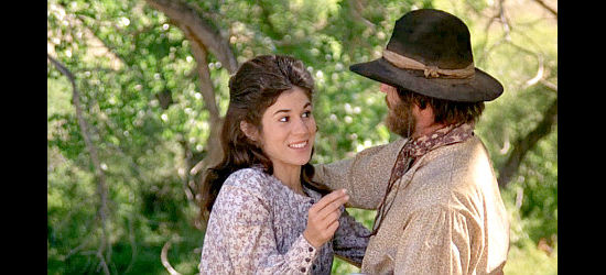 Kathleen Lloyd as Jane Braxton with Tom Logan (Jack Nicholson), wondering if riding face to face constitutes lewd behavoir in The Missouri Breaks (1976)