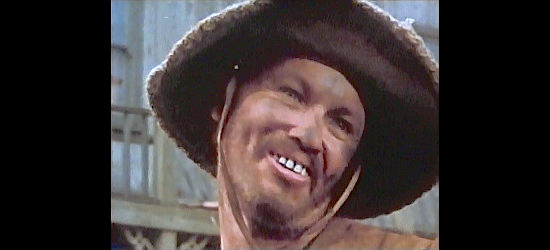 Kenny Adams as Artie, the barfly who gets on Kid Dandy's nerves in Gone with the West (1974)
