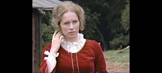 Liv Ullmann as Hannah, dessed up for a barbeque to her husband's displeasure in Zandy's Bride (1974)
