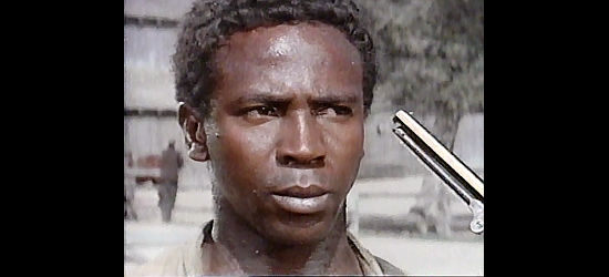 Louis Gossett Jr. as Jason O'Rourke, trying to talk his way to freedom in Skin Game (1971)