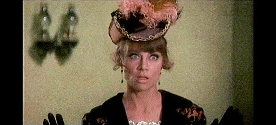 Nita Talbot as Madam Esther, caught in the middle of a bank robbery in Buck and the Preacher (1972)
