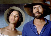 Vonetta McGee as Thomasine and Max Julien as Bushrod posing for a photo in Thomasine and Bushrod (1974)