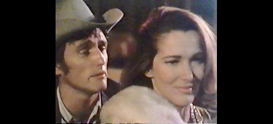 Dennis Hopper as Kansas, flirting with Mrs. Anderson (Julie Adams) in front of his girlfriend and her husband in The Last Movie (1971)