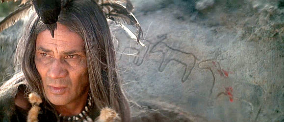 Enrique Lucero as Raven, the Yellow Hand medicine man in The Return of a Man Called Horse (1976)