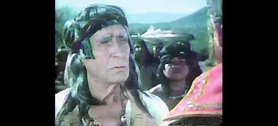 Gil Escandon as Chief Tanak, negotiating with Gen. Lafuente in Mission to Glory (1977)