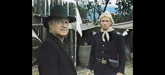 Lautara Murua as Preacher Perkins and Vaughn Armstrong as Capt. Cummings, trying to keep the settlers in line in Triumphs of a Man Called Horse (1983)