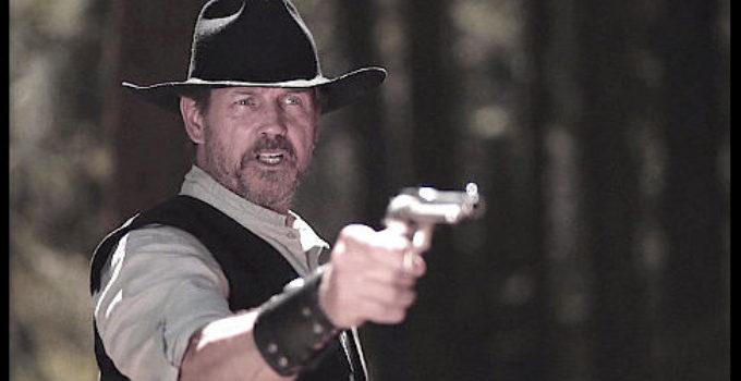 Michael Pare as Jericho faces down a bounty hunter on his trail in Righteous Blood (2021)
