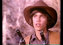 Robby Benson as Jory Walden, ready for trouble and spotting a girl bathing in Jory (1973)