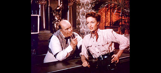 Billy House as bartender Uncle Barney with Maria Hart as Paradise Saloon bouncer Dora in Outlaw Women (1952)
