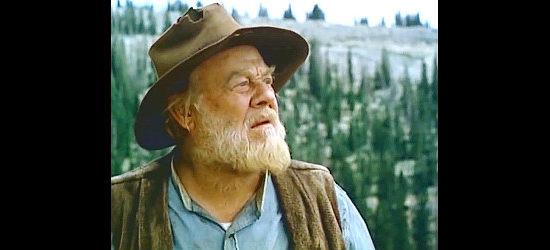Burl Ives as Mr. McGraw, the hermit who proves not the least bit crazy in Baker's Hawk (1976)