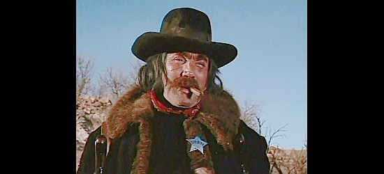 Cameron Mitchell as Shadrack Peltzer, the lawman on the trail of Tank Logan in The Quest (1976)