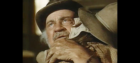 Dub Taylor as Boomer Riley, welcoming an orphaned niece in Pony Express Rider (1976)