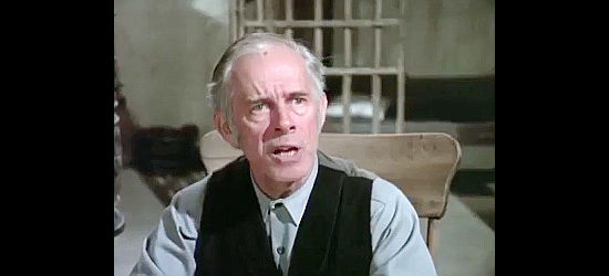 Harry Morgan as Sheriff Jenkins, wondering why anyone would be interested in romancing his daughter in Sidekicks (1974)