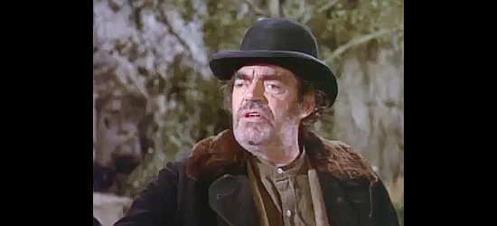 Jack Elam as Boss, handing out instructions for his planned bank robbery in Sidekicks (1974)