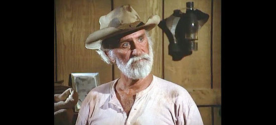 Keenan Wynn as Cooler, the man who hires on as cook for the cattle drive in The Quest -- The Longest Drive (1976)