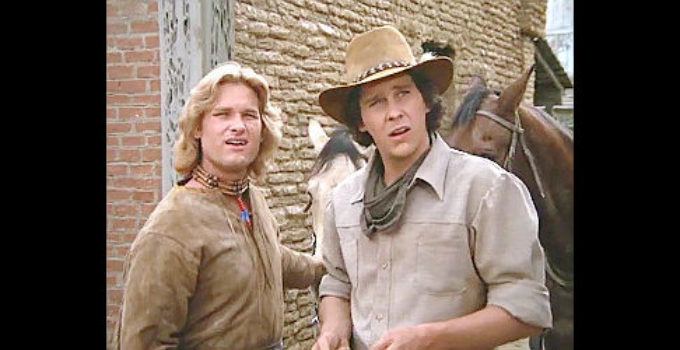 Kurt Russell as Morgan Beaudine and Tim Matheson as Quinton Beaudine, rounding up a crew for a cattle drive in The Quest -- The Longest Drive (1976)