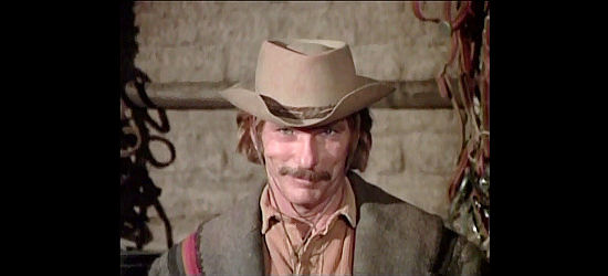 L.Q. Jones as Ben Lawler, the veteran Indian fight coerced into helping solve the Navajo mystery in The Bravos (1972)