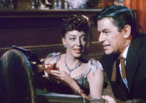 Marie Windsor as Iron Mae McLeod and Richard Rober at Woody Callaway in Outlaw Women (1952) promo