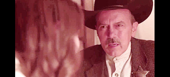 Mike Gaba as Sheriff Austin Shelby, listening to Nellie Harper's story in Showdown at Shelby's Shack (2019)