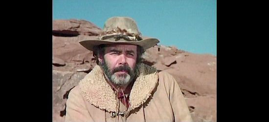Pernell Roberts as Jackson Buckley, the guide leading a wagon train west until the Kiowa attack in The Bravos (1972)
