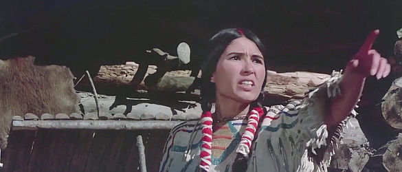 Sacheen Littlefeather as Pale Flower issues a warning to her husband Guthries in Winterhawk (1975)