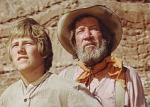 Stewart Peterson as Sam Sutter and Richard Boone as Russian spot the crooked sky in Against a Crooked Sky (1975)