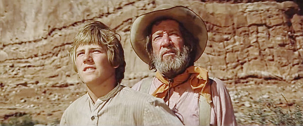 Stewart Peterson as Sam Sutter and Richard Boone as Russian spot the crooked sky in Against a Crooked Sky (1975)