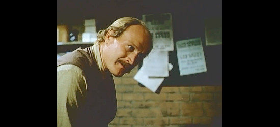Taylor Lacher as Sheriff Sweeney, trying to recruit help dealing with troublemakers in Baker's Hawk (1976)