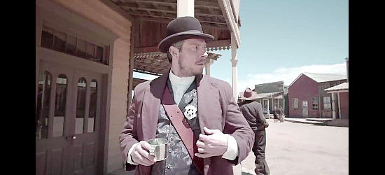 Zach Rose as Marshal Clayton Thorn, arriving in the town of Destiny to make sure Nellie is okay in Showdown at Shelby's Shack (2019)