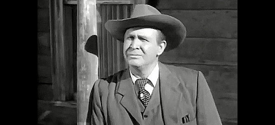 Barton MacLane as Marvin Parker, the banker trying to squeeze ranchers off their land in Cow Country (1953)