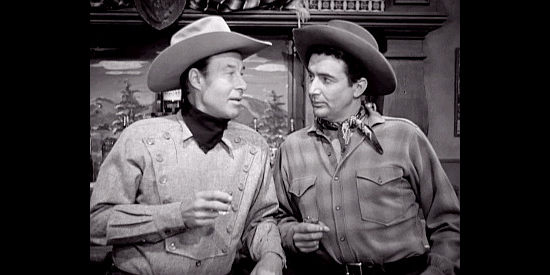 Bill Elliott as Jim Levering and Rick Vallin as Ray Hammond arriving in Topeka (1953)