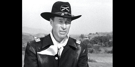 Bill Elliott as Lt. Pete Devlin, meeting headstrong Della Watson in The Maverick (1952)